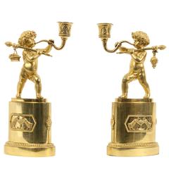 Pair of French Gilt Bronze Figural Candlesticks