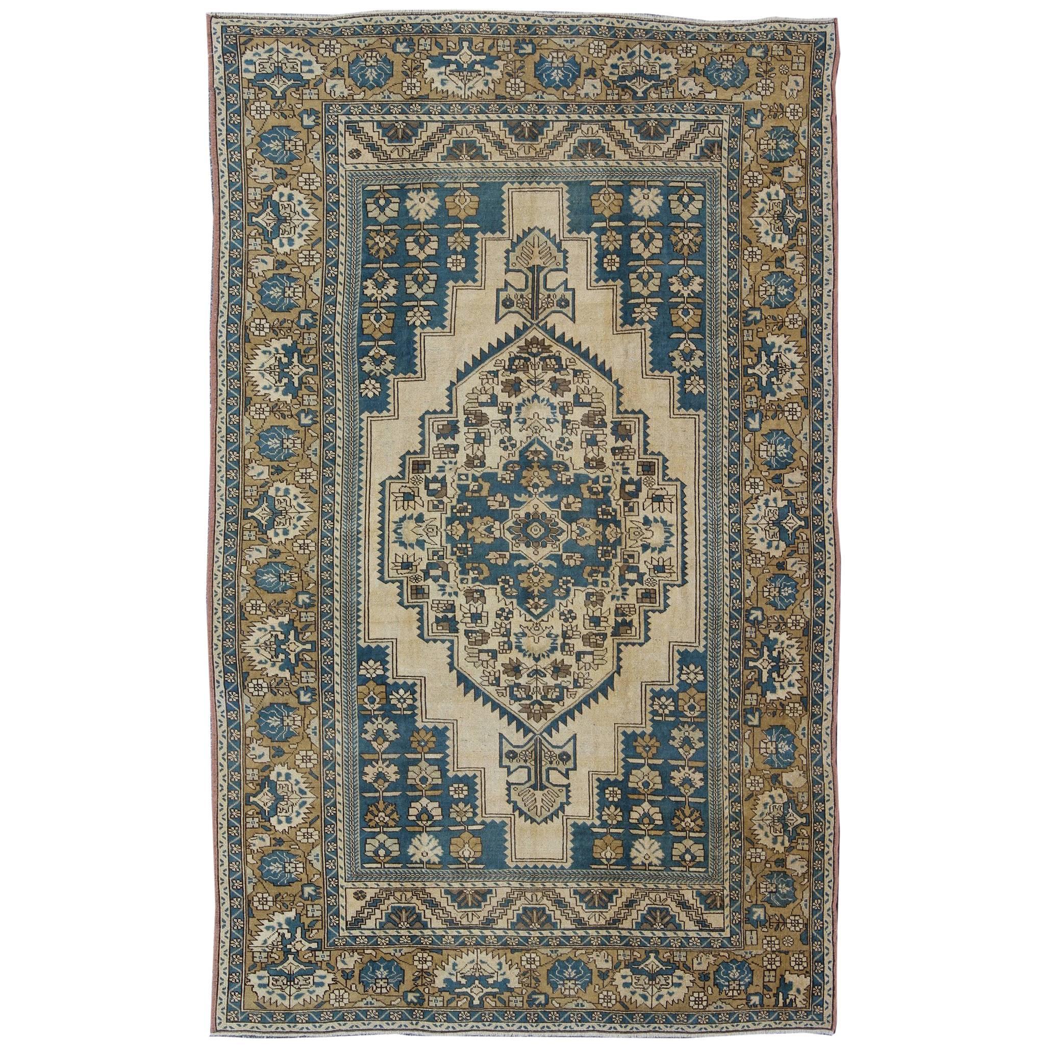 Vintage Turkish Rug with Geometric Design in Blue, Gold and Cream Colors For Sale
