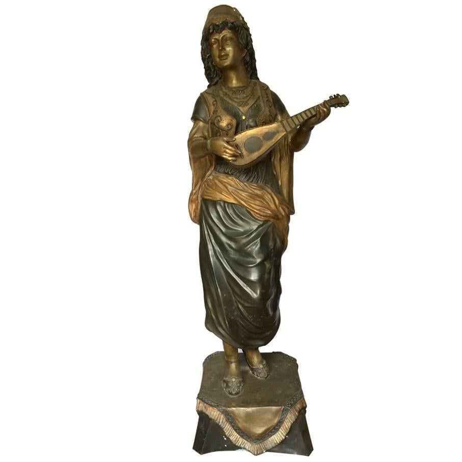 Bronze Female in the Orientalism Style Playing an Instrument