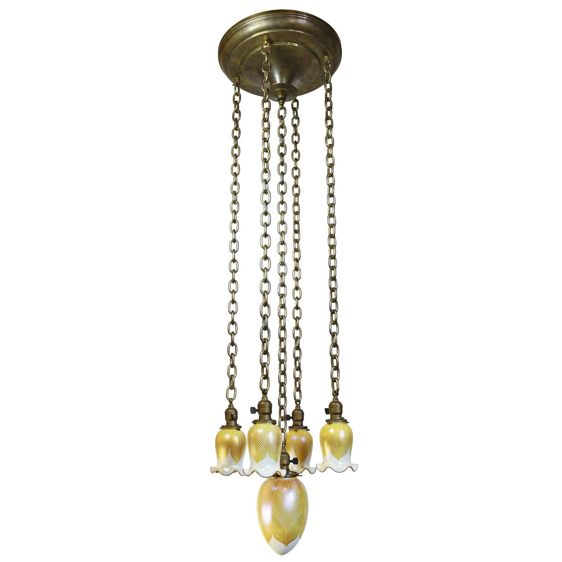 Stunning Set of Pulled Feather Quezal Shades on Cast Brass Pan Fixture