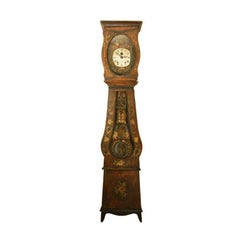 Milieu du XIXe siècle. Horloge provinciale française de style Louis XV à boîtier Morbier