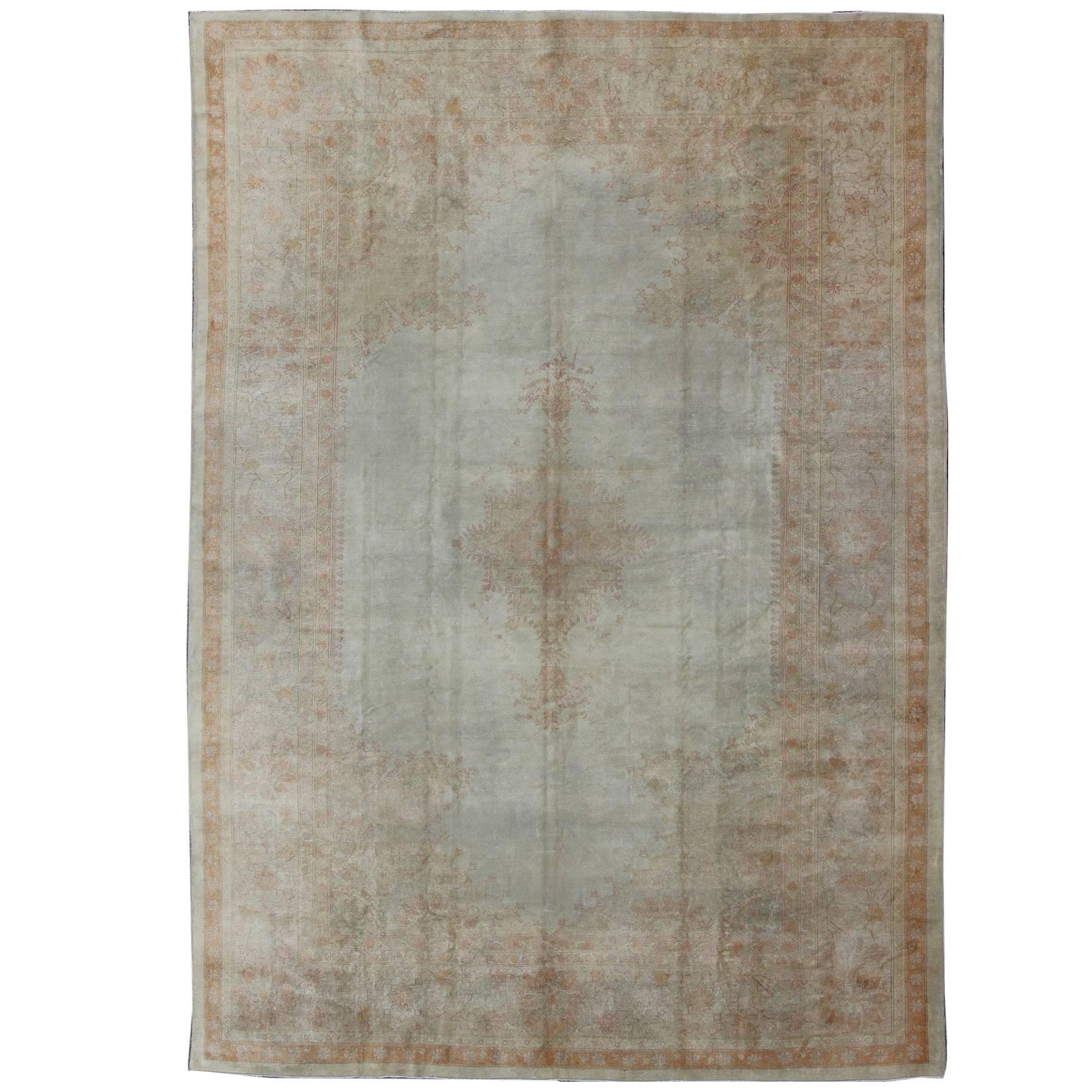 Antique Turkish Burlu Oushak Rug with Fine Weave in Muted Colors For Sale