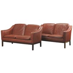 Pair of Danish Modern Leather Two-Seat Sofas