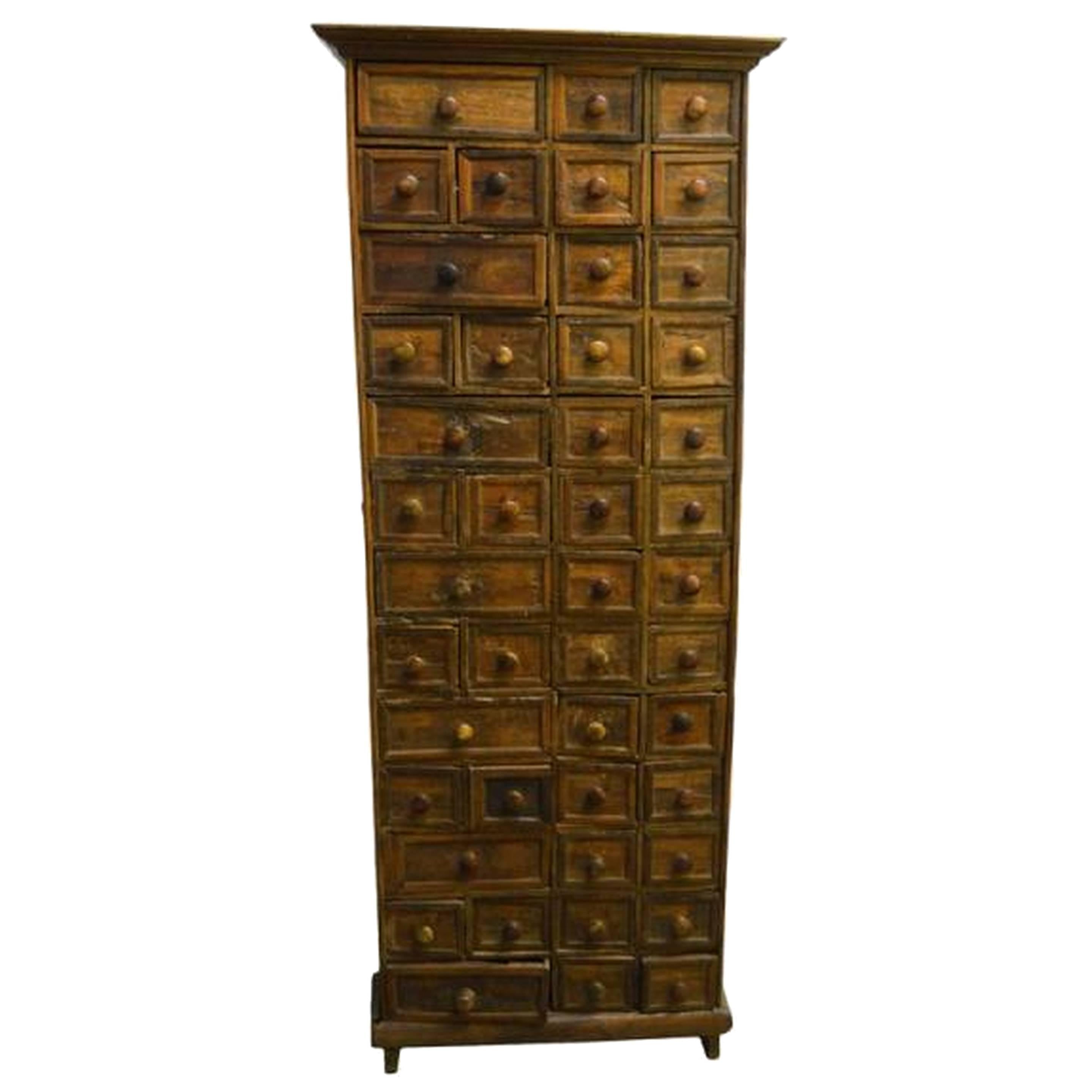 Antique Indonesian Apothecary Cabinet with 45 drawers from the 19th Century