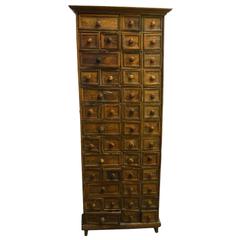 Used Indonesian Apothecary Cabinet with 45 drawers from the 19th Century