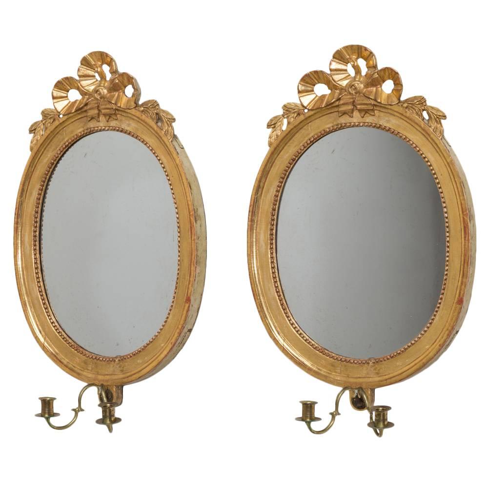 Pair of Swedish Oval Giltwood Mirrors, circa 1760 For Sale