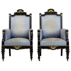  Pair of 19th Century French Ebonized and Ormolu Armchairs