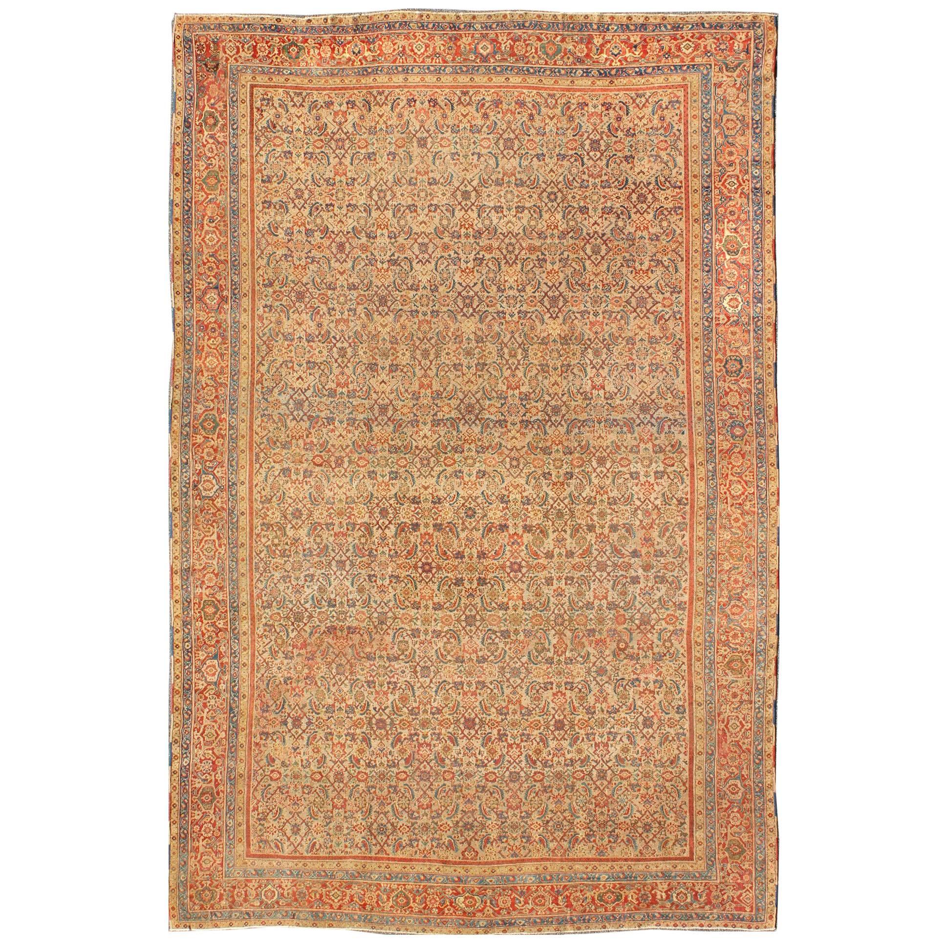 Grandiose Antique Persian Sultanabad Rug in Tan Background, Rust Red, Green For Sale