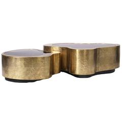 Set of Two Curvilinear Hammered Brass, glass Coffee Tables from Europe