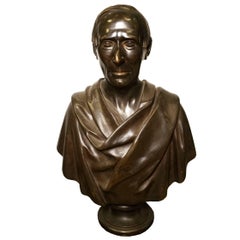 Fino busto de bronce patinado de un noble romano o griego