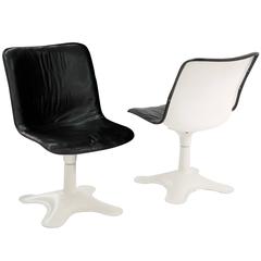 Pair of Swiveling Lounge Chairs with Black Leather Upholstery by Yrjo Kukkapuro 