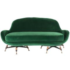 Vintage Smooth green sofa, marked IPE; particular feet in beechwood; Bologna, Italy 1963