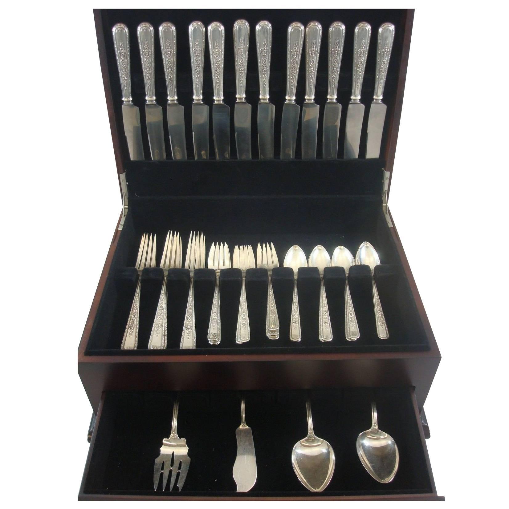 Lady Sterling by Weidlich sterling silver dinner size flatware set of 52-piece set, in excellent condition. This circa 1927 pattern features a design that looks like Fine lace. This set includes:

12 dinner knives, 9 1/2