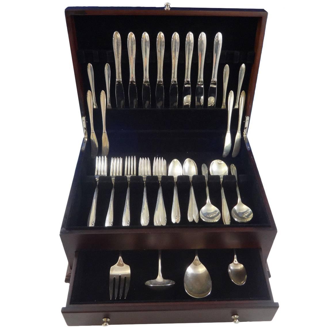 Lasting Spring by Oneida sterling silver flatware set of 52 pieces. This pattern has a simple, Mid-Century Modern design. This set includes:

Eight knives, 8 7/8