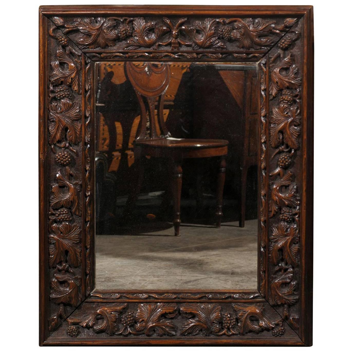 German Black Forest Carved Mirror with Foliage Motifs from the Late 19th Century