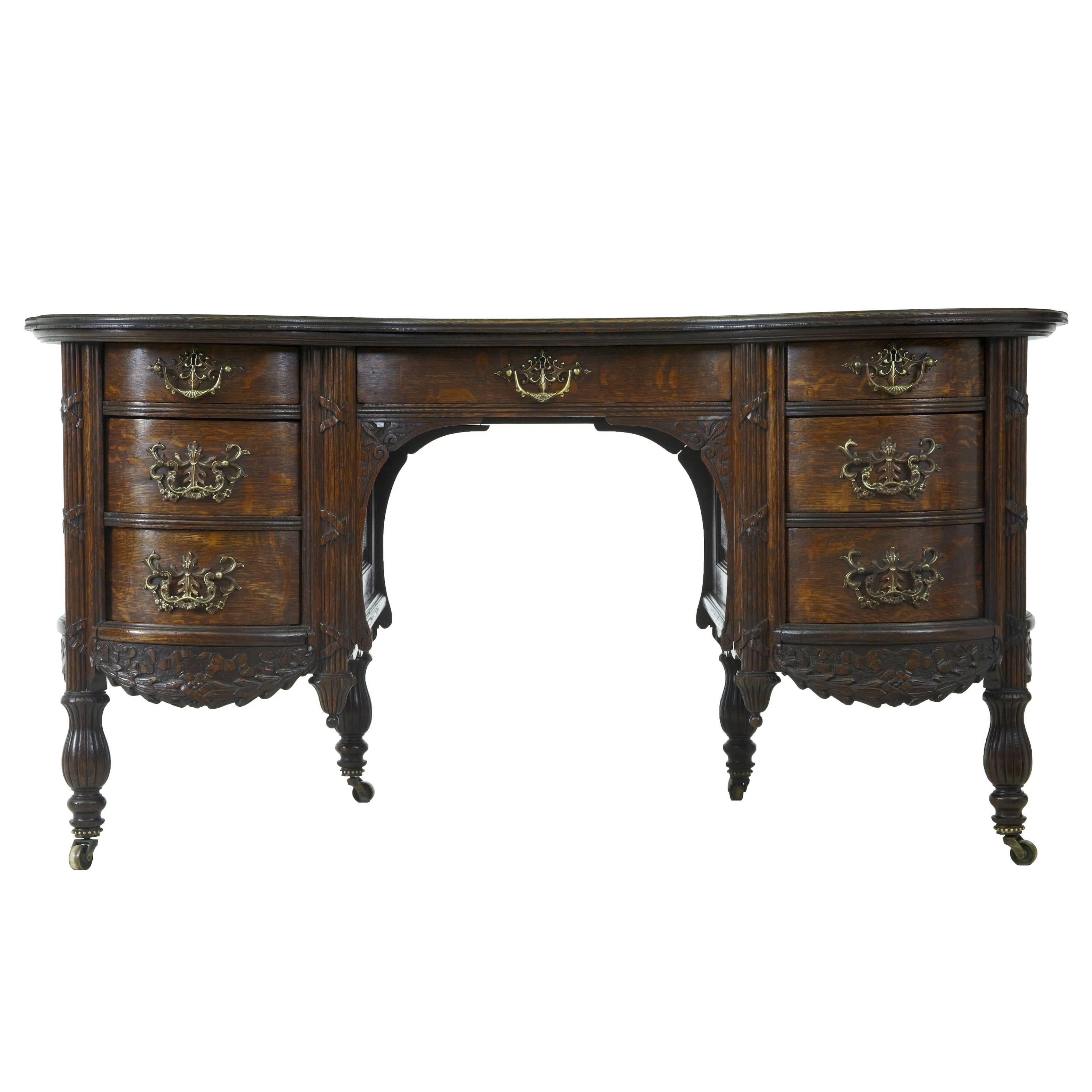 Late 19th Century Carved Oak Kidney Shaped Writing Desk