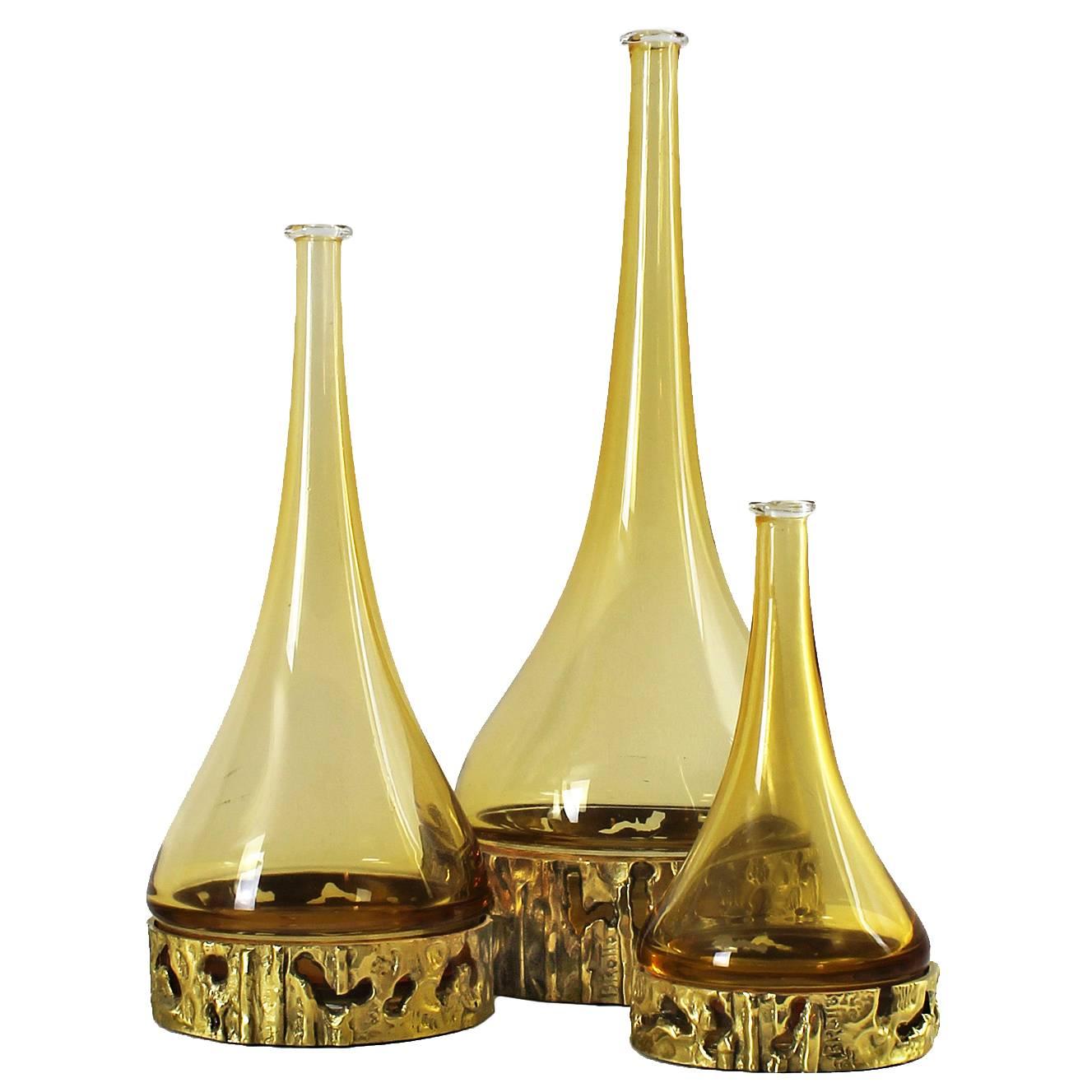 Ensemble de trois bouteilles en verre de Murano des années 1970 par Angelo Brotto, verre jaune, bronze - Italie