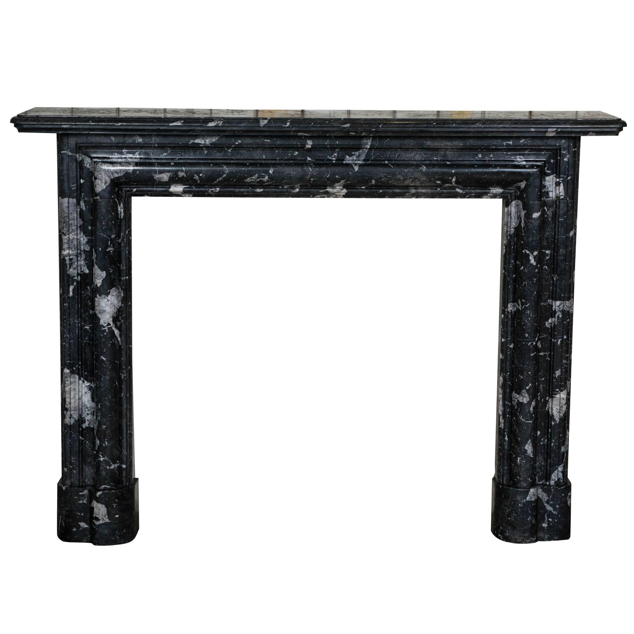 Antique Black Marble Bolection Fire Surround For Sale