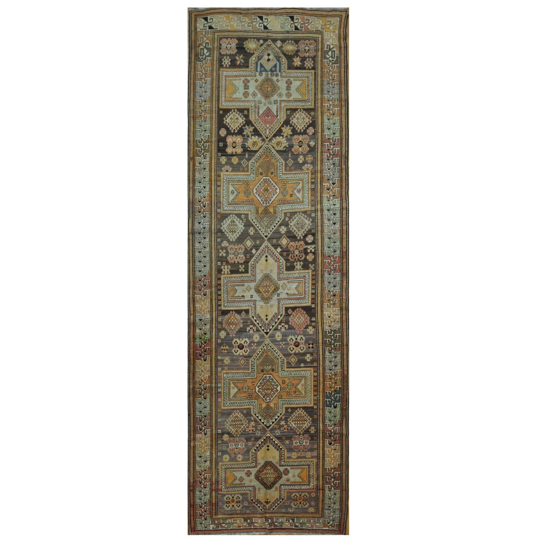 Long Antique Hand Knotted Wool Green Brown Red Caucasian Runner Rug For Sale