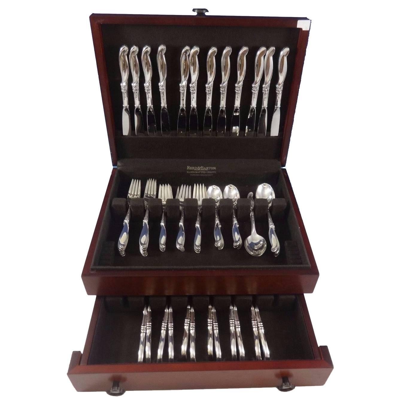 Stunning silver melody by International sterling silver flatware set of 72 pieces. This set includes:

12 knives, 9 1/4