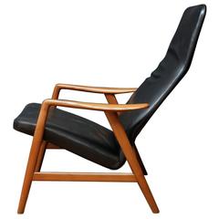 Black Leather Lounge Chair Supported by Sculptural Teak Frame, Danish, 1960s