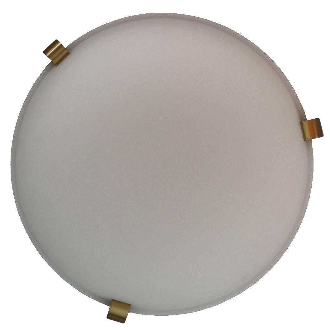 Jean Perzel - A fine French Art Deco ceiling or wall light with a white opaline frosted glass shades supported by three bronze studs.


