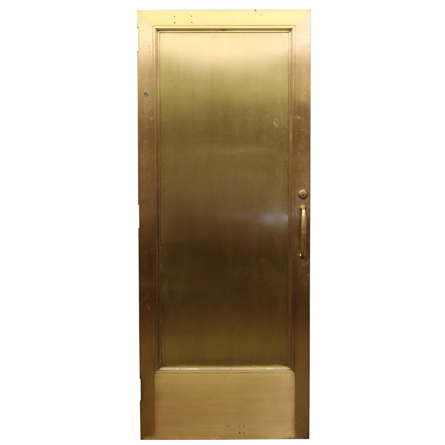 1920s Brass Lobby Door with Wood Veneer on One Side and Original Hardware For Sale at 1stdibs