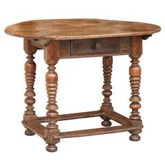 Oval French Early 19th Century Walnut Table with Stretcher and Single Drawer