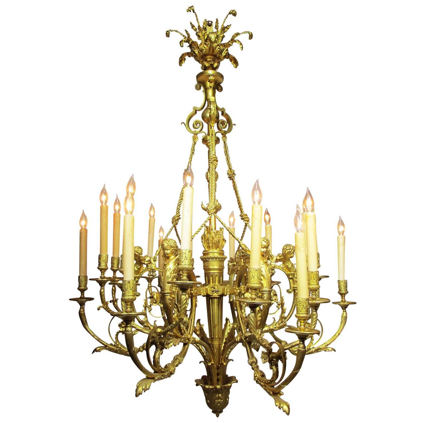 A French Belle Époque 19th-20th Century 18-Light Gilt Bronze Cherub Chandelier For Sale