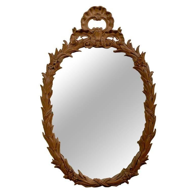 French Louis XV Style Oval Carved Wood Mirror with Foliage Motifs
