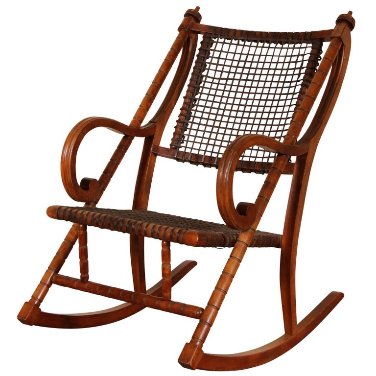 Antique Rocker with an Upholstery Webbing Seat