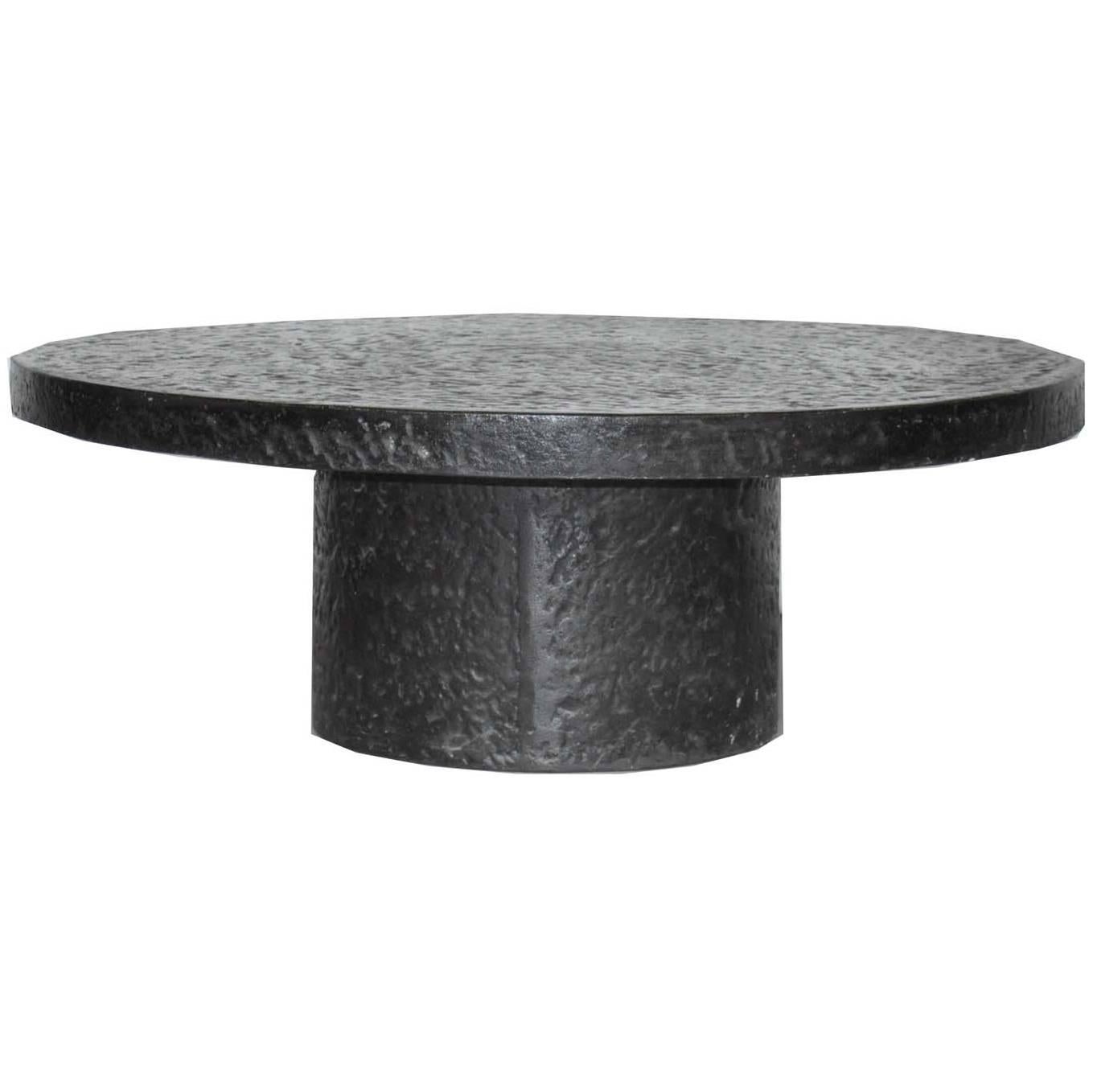 Round Black Brutalist Coffee Table in the style of Ado Chale