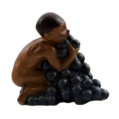 Bing & Grondahl, Stoneware Figurine of Boy with Bunch of Grapes by Kai Nielsen