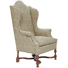 Fauteuil ancien à dossier Wingback