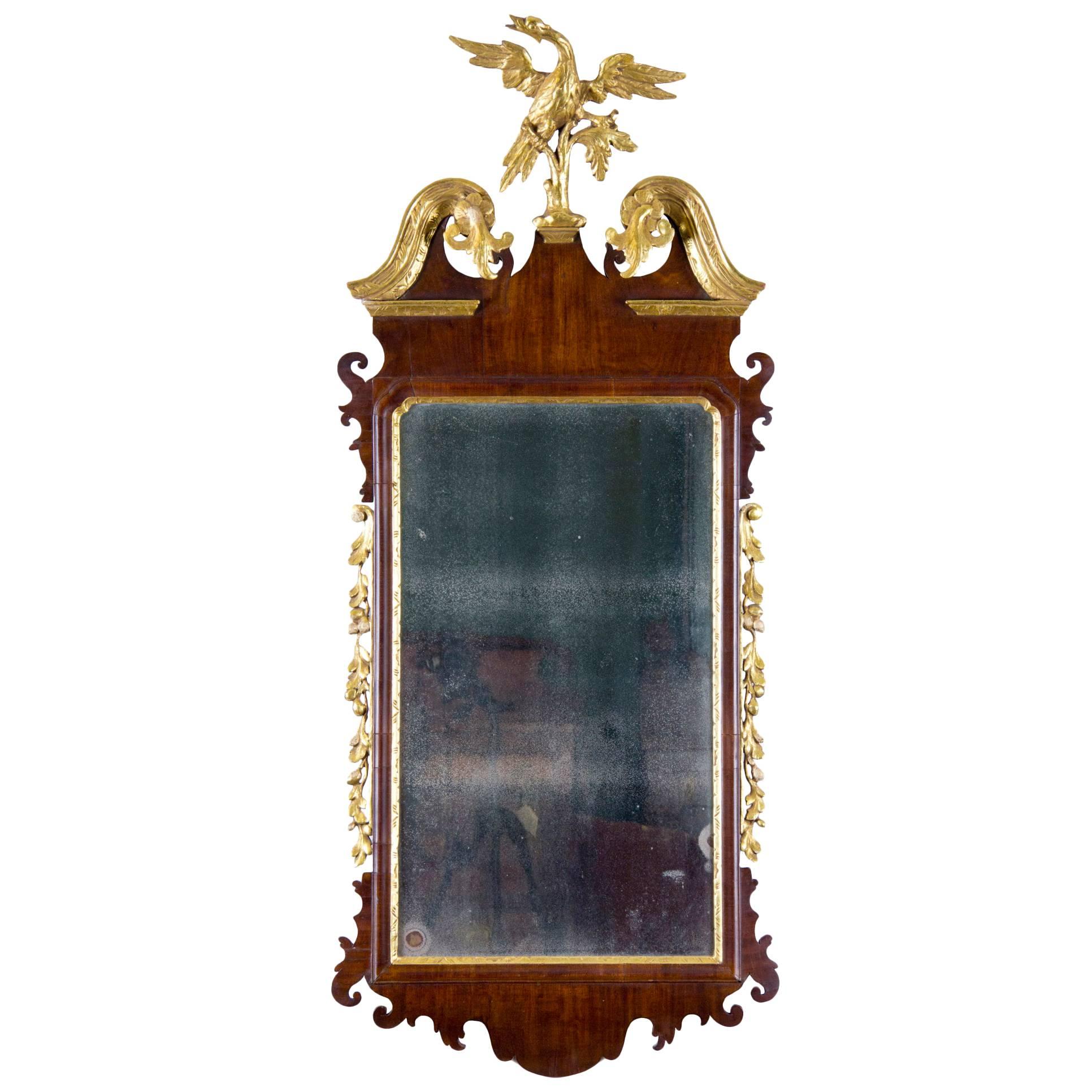 Chippendale Mahogany Parcel-Gilt Mirror with Phoenix Finial, American or English For Sale