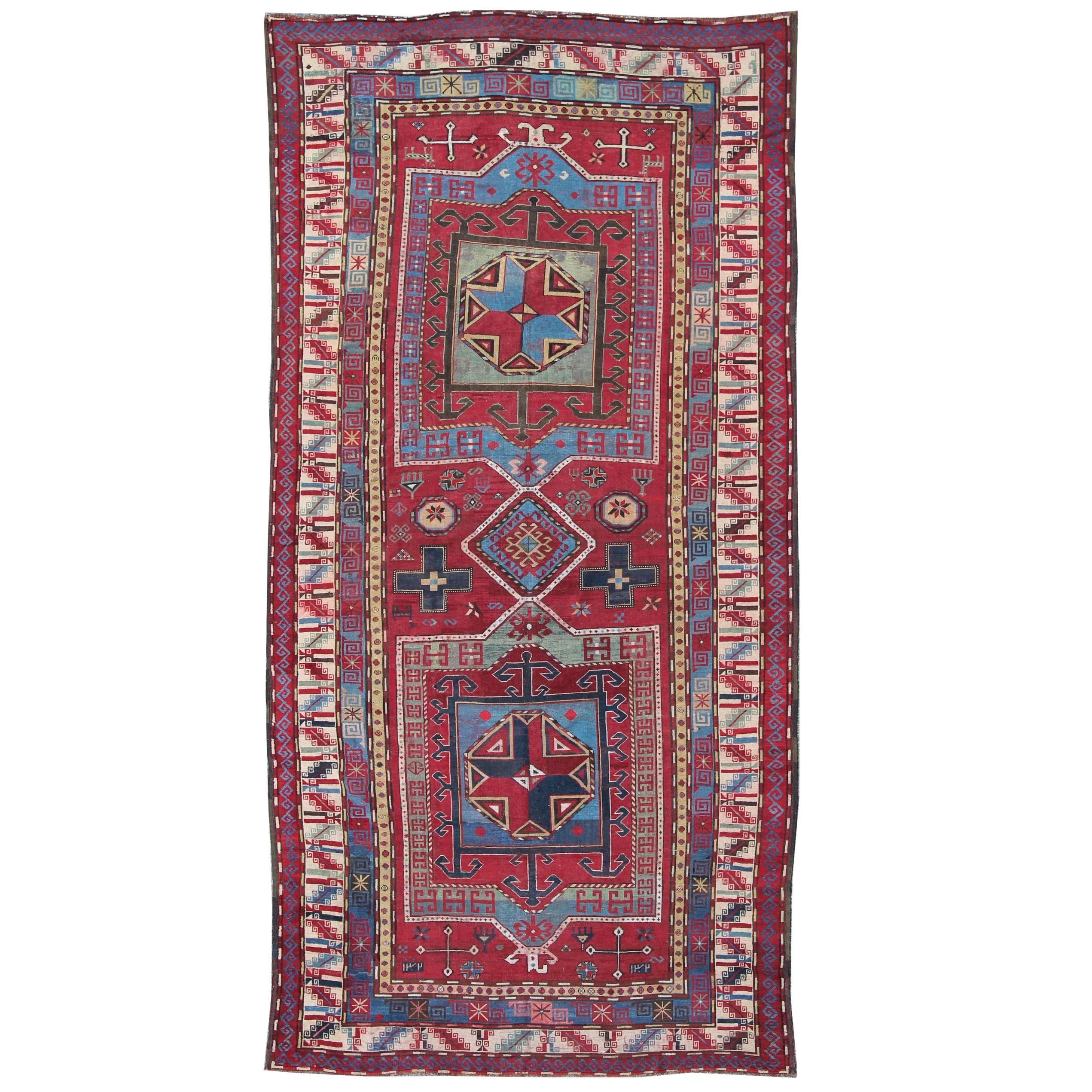 19th Century Antique Caucasus Kazak Gallery Carpet With Dual Geometric Medallion For Sale