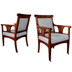 Rare Pair of French Art Nouveau Carved Mahogany Armchairs