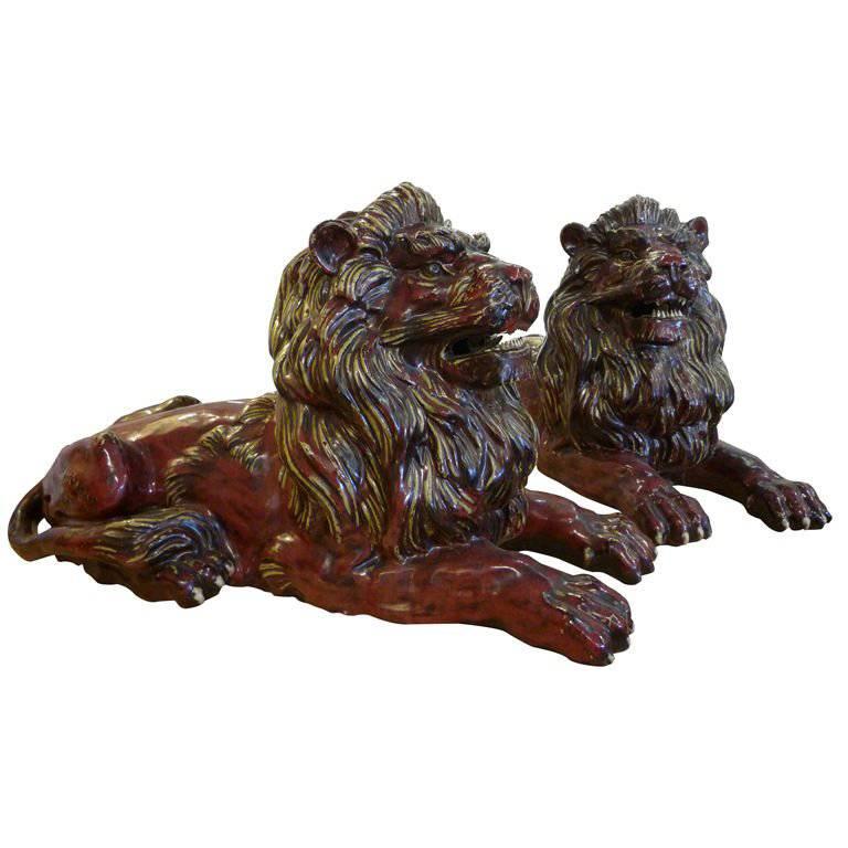 Pair of Early 20th Century Glazed Stoneware Hand Formed Lions