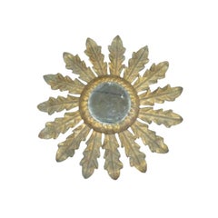 Miroir français en fer doré des années 1940 en forme de rayon de soleil