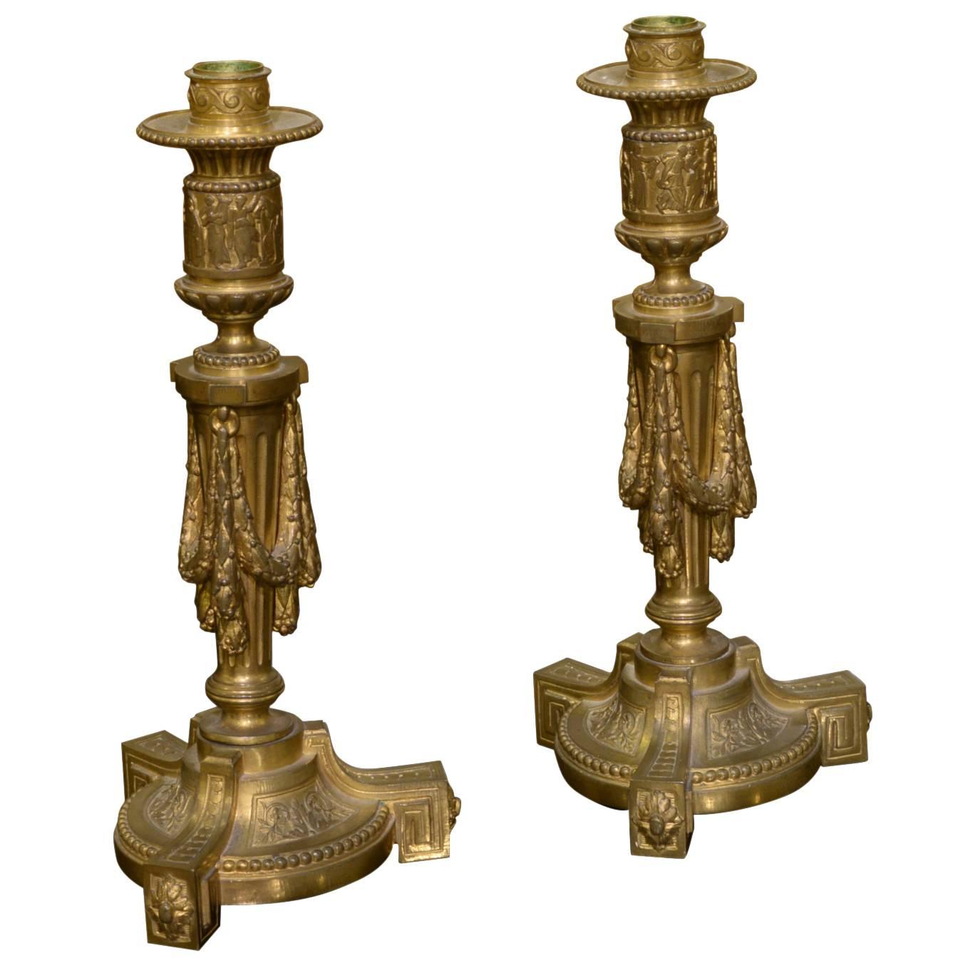 Pair of French Louis XVI Gilt Bronze Candlesticks For Sale