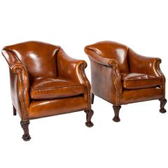 Stunning Pair of Antique Leather Armchairs