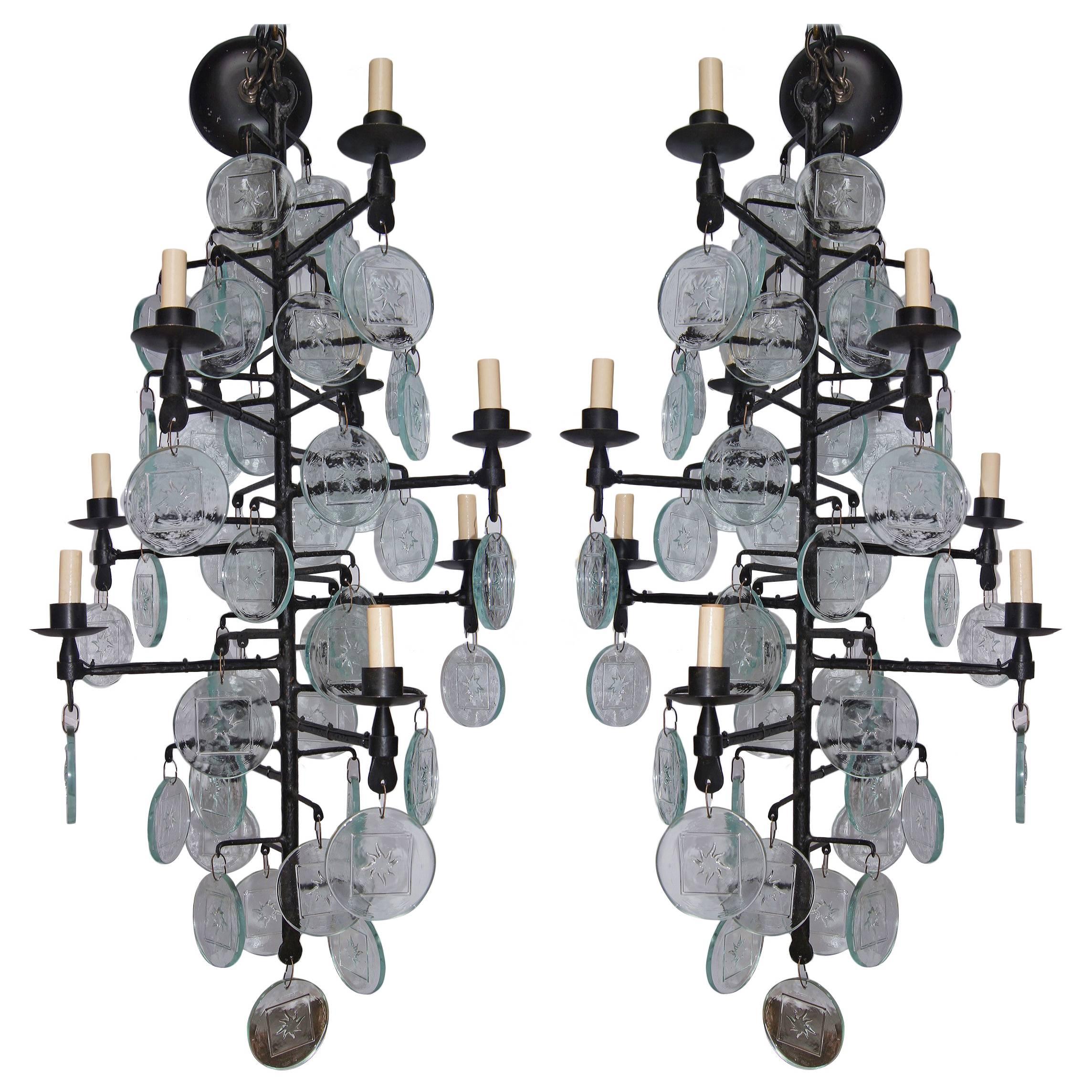 Pair of Wrought Iron and Molded Glass Chandeliers. Sold Individually.