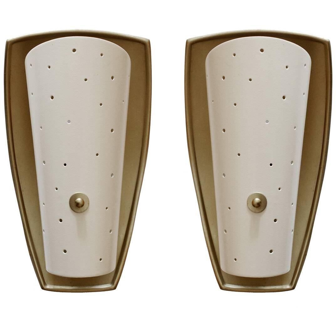 Rare pair of sconces in the style of Jacques Biny,
France, 1950s.
 