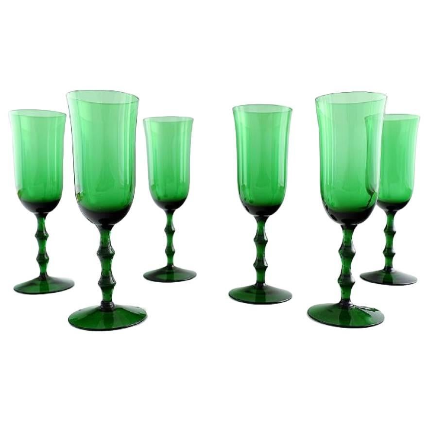 Simon Gate Orrefors, a Set of Six Green Champagne Art Glasses