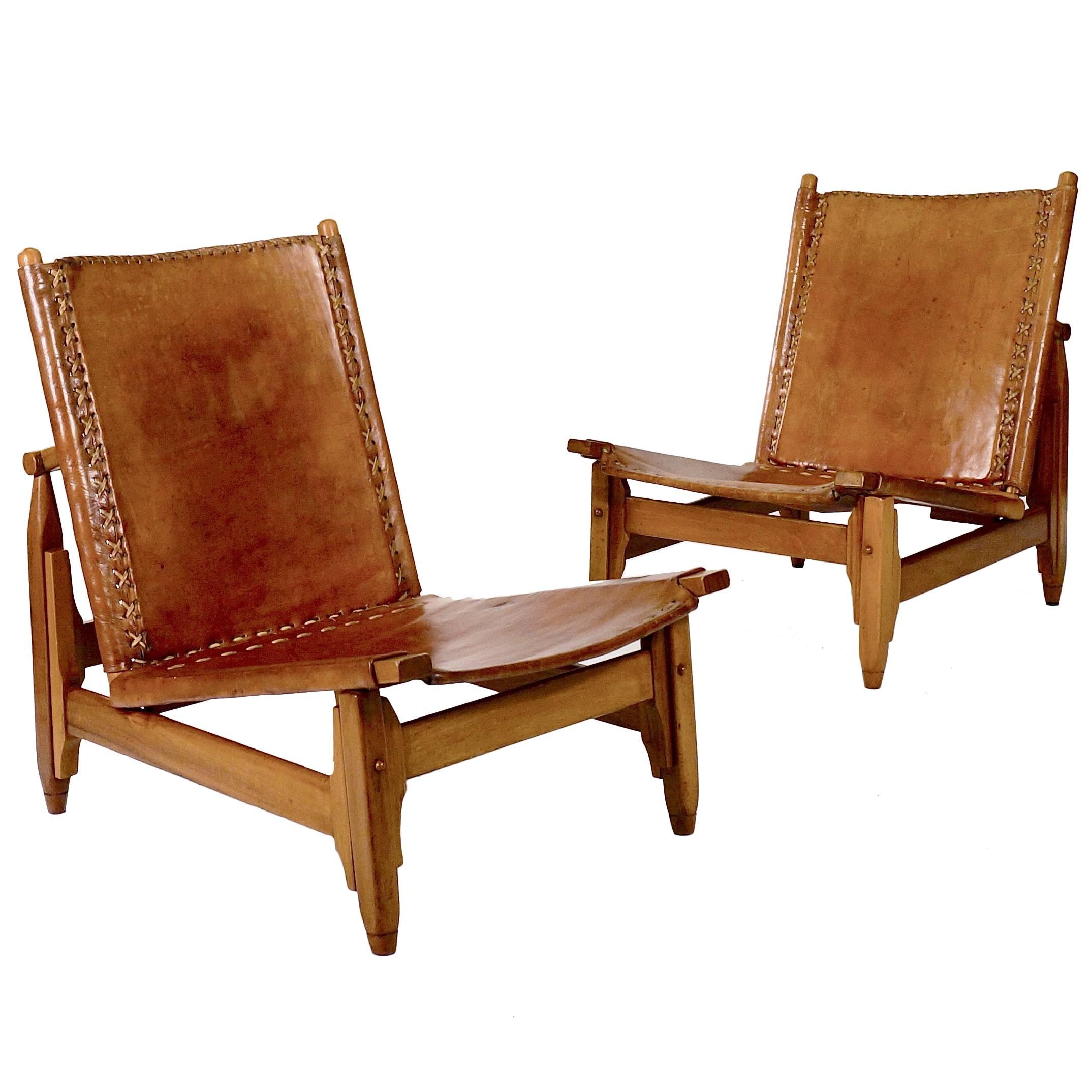 Pair of Saddle-Stitched Leather and Walnut Low Chairs