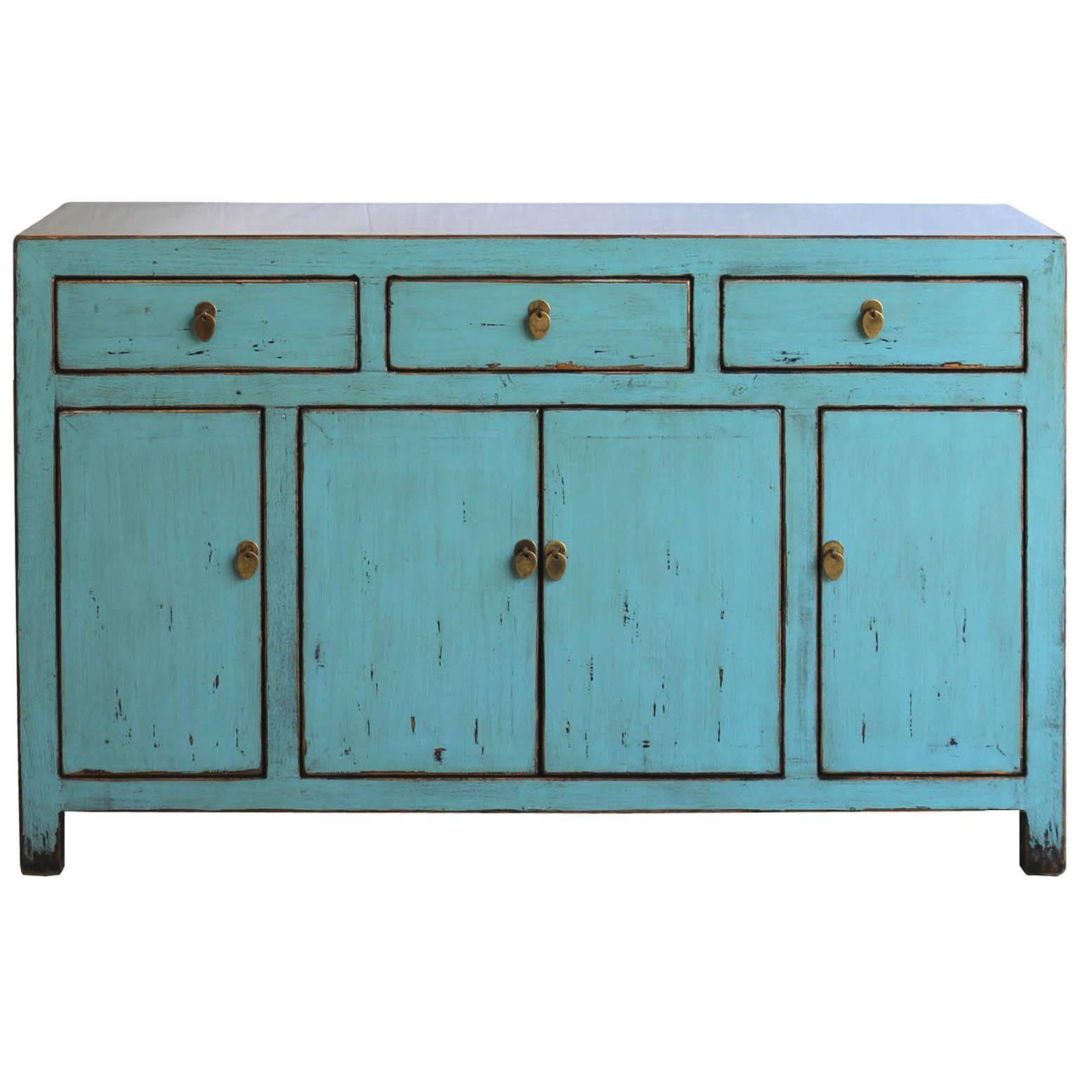 Contemporary three-drawer light blue lacquer sideboard with exposed wood edges. Use as a media chest or as a sideboard in the dining room.