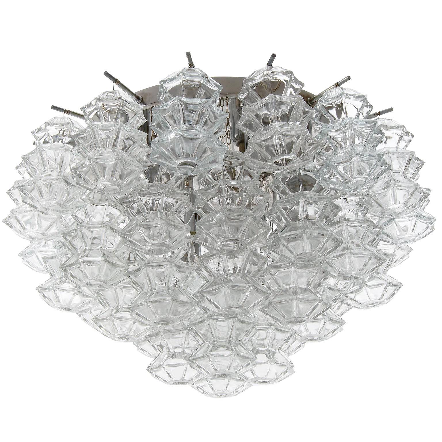 One of four large flush mount chandeliers 