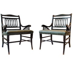 Pair of Anglo-Japanese Ebonized Open Armchairs. Attributed to Jas Shoolbred