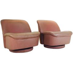 Pair of Blush Leather Swivel and Tilt Chairs by Directional