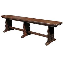 1880s English Rustic Long Wooden Bench with Trestle supports and Stretcher